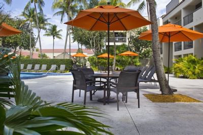 tables near outdoor pool