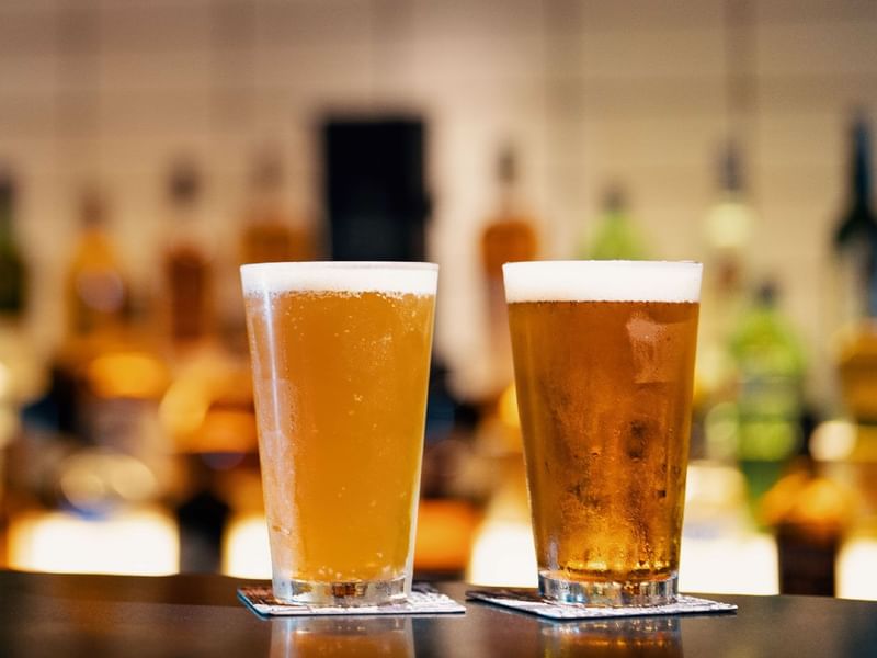 Close-up of 2 glasses of beer on a table at Sunway Resort
