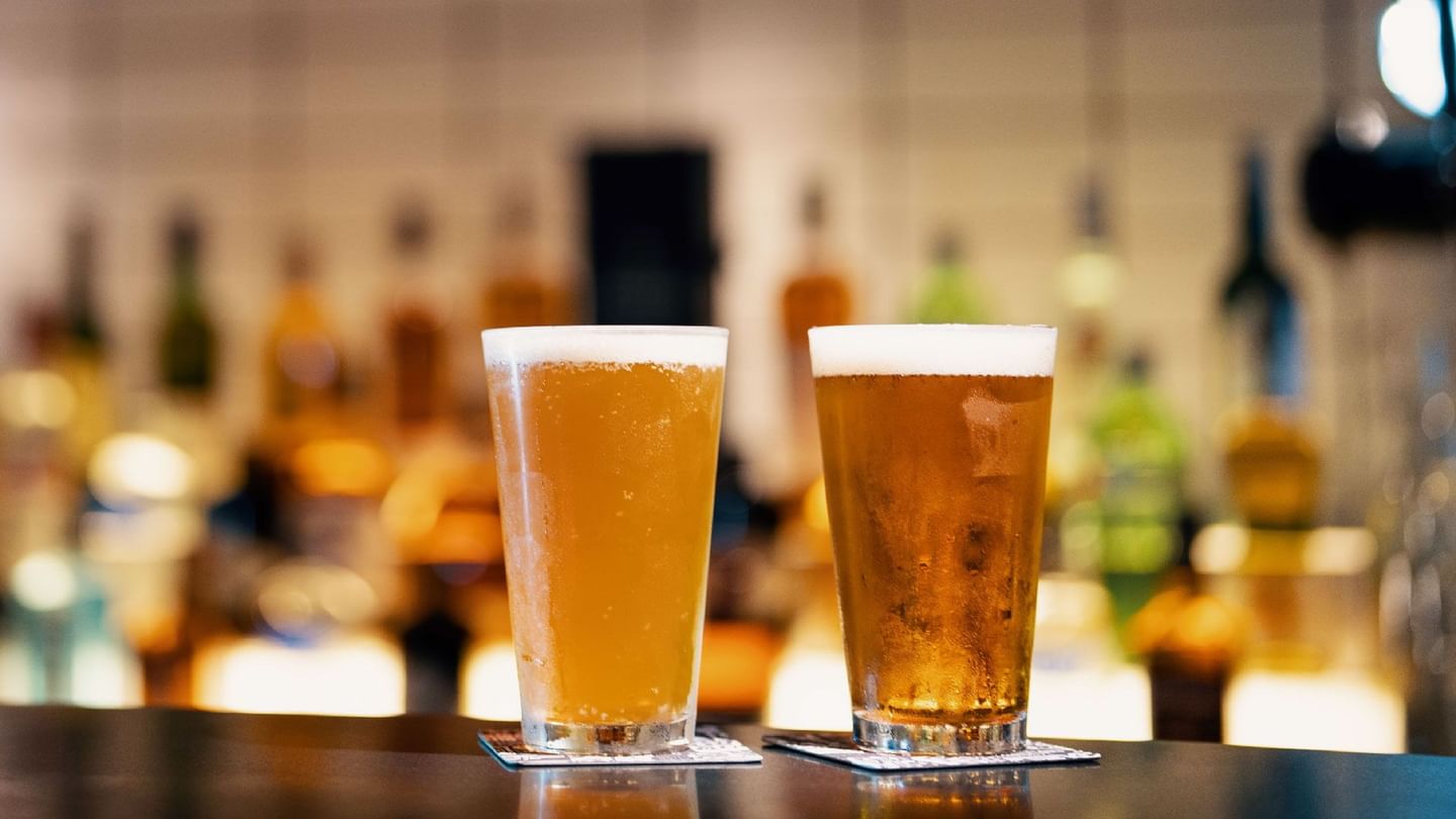 Close-up of 2 glasses of beer on a table at Sunway Resort