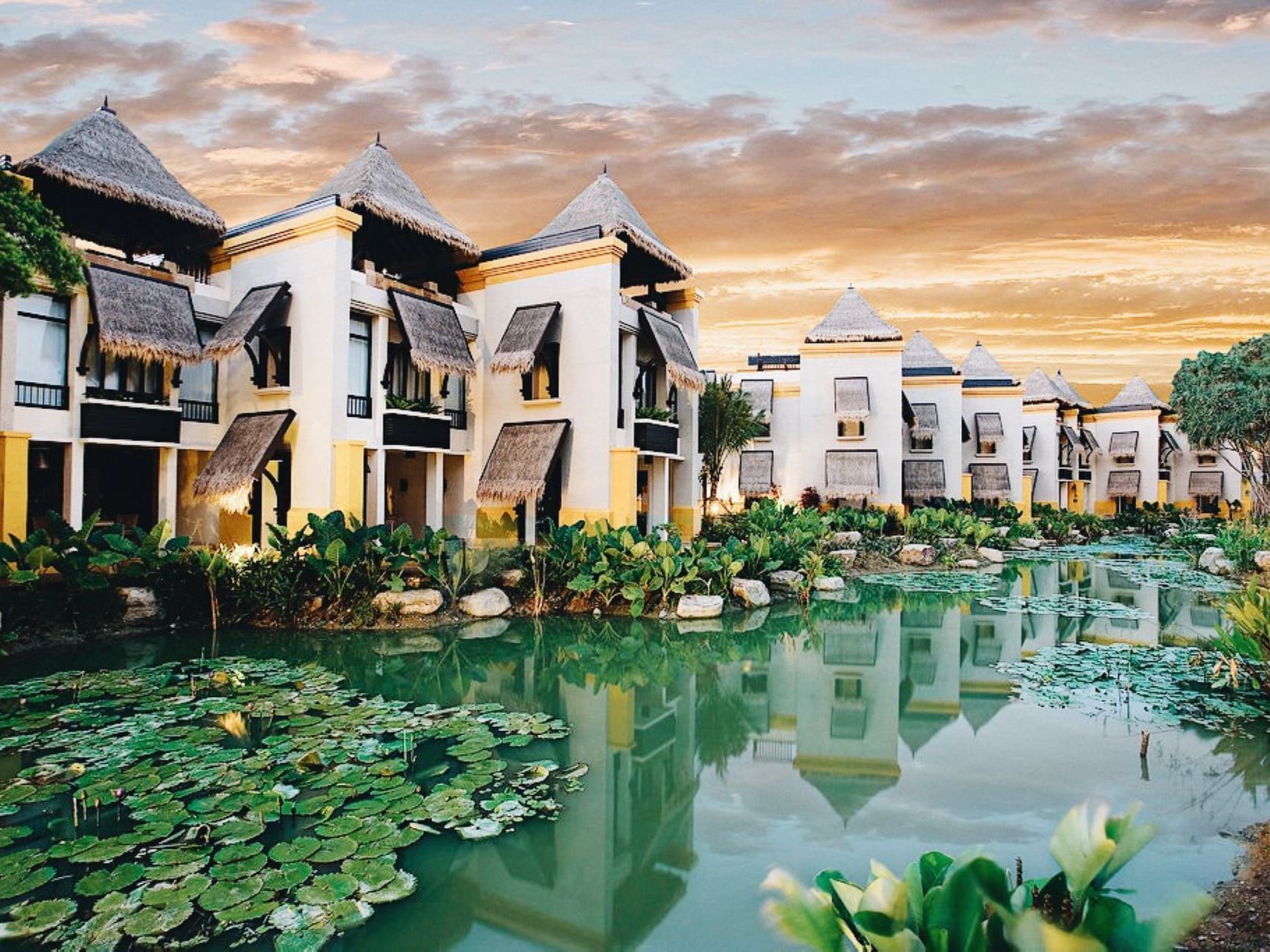 Canal with flowers at Paradox Phuket Resort in Paradox Resort