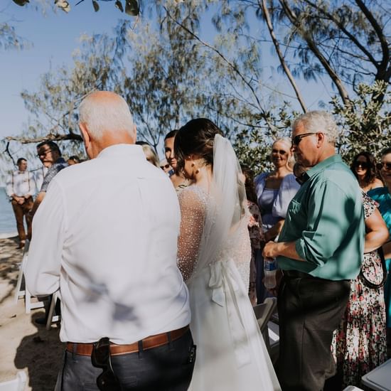 Couple with gathering at Pullman Palm Cove Sea Temple Resort