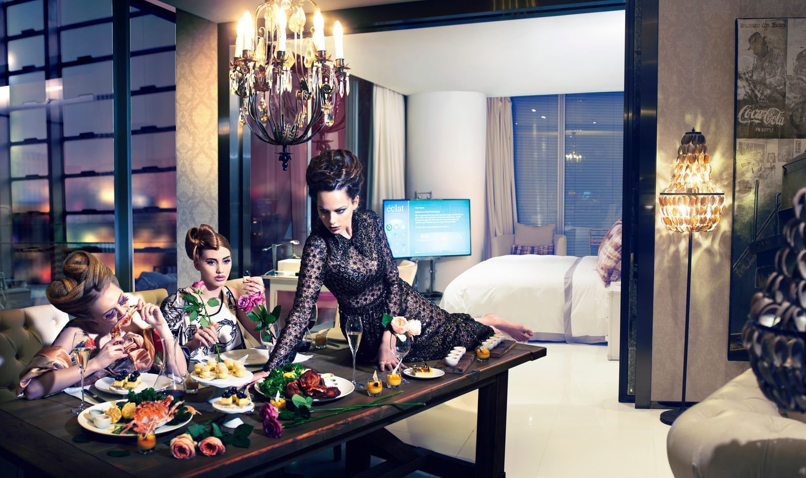 Models posing on a dining table at Hotel Éclat Beijing