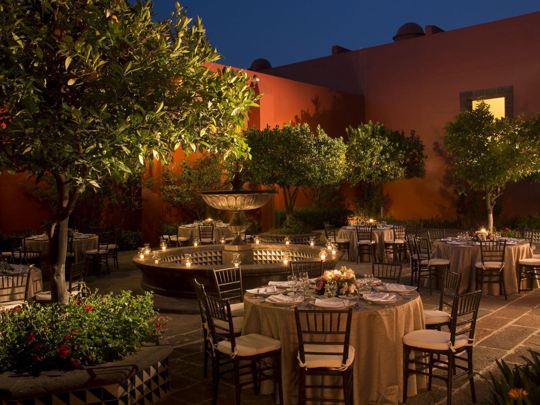 Outdoor dinner tables at the La Coleccion Resorts