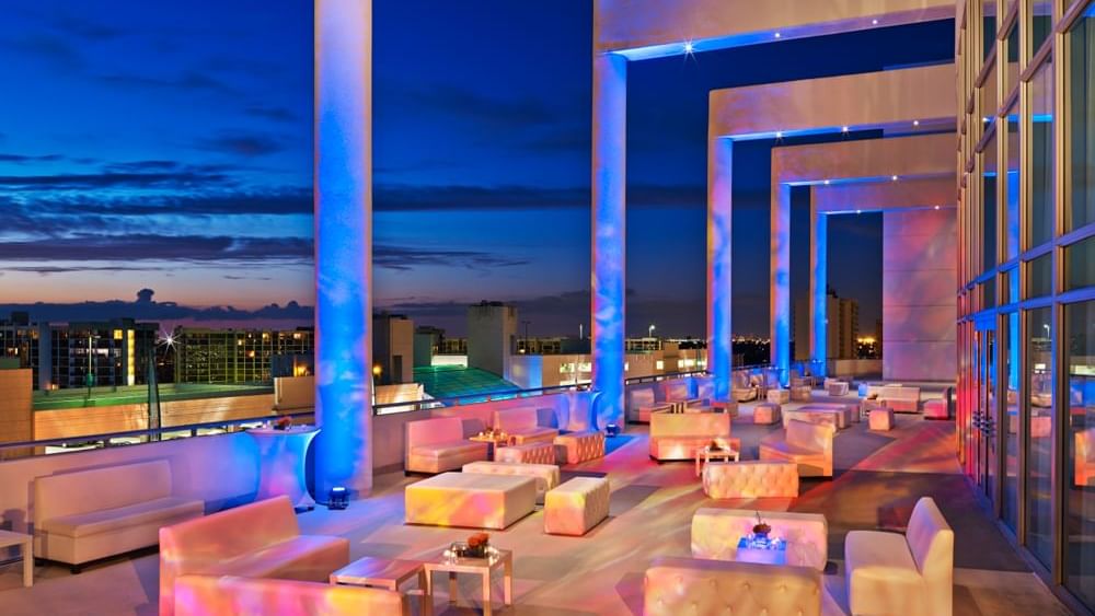 Lounge area with cozy chairs arranged in Terrace at The Diplomat Resort