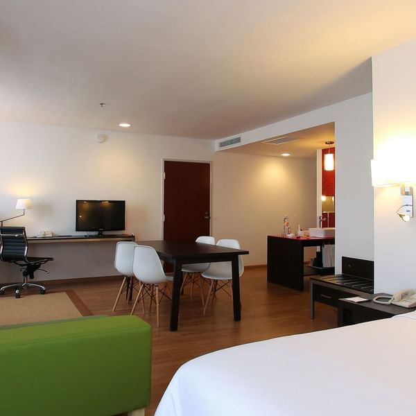 Living & dining area of Junior Suite at Fiesta Inn