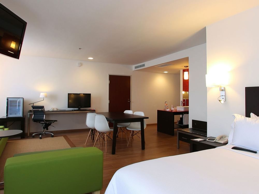 Living & dining area of Junior Suite at Fiesta Inn