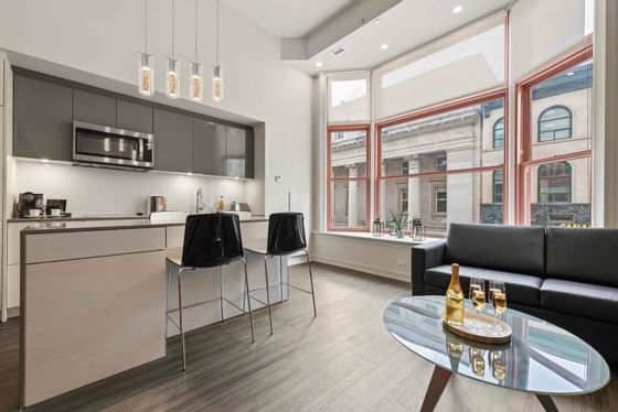 Kitchen and living area in Heritage suite at ReStays Ottawa
