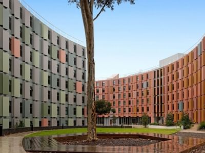 Modern La Trobe University - North and South Apartments with vibrant facade and landscaped courtyard.