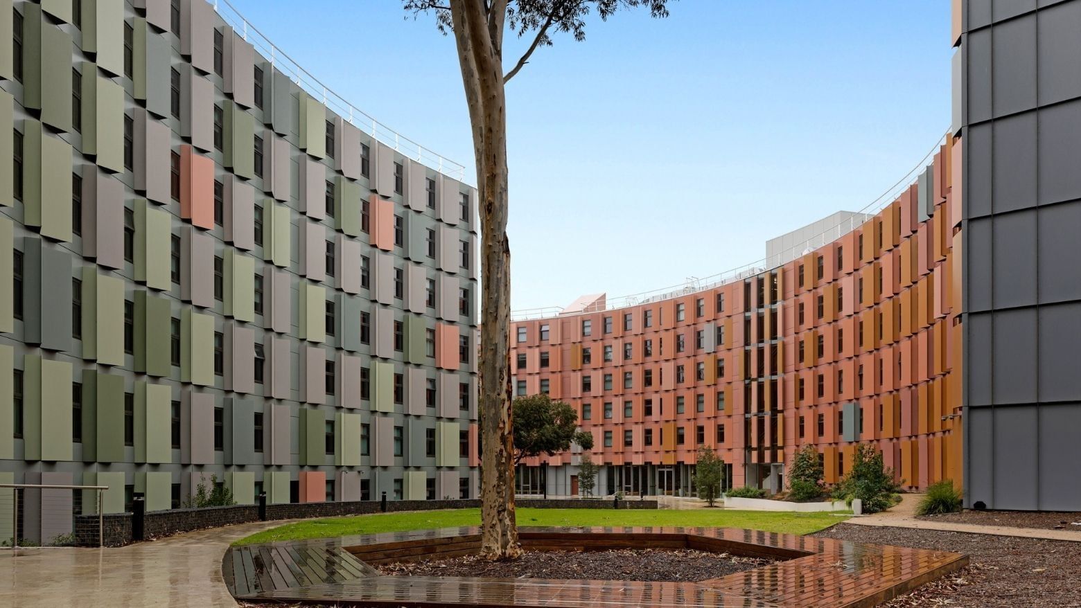 Modern La Trobe University - North and South Apartments with vibrant facade and landscaped courtyard.