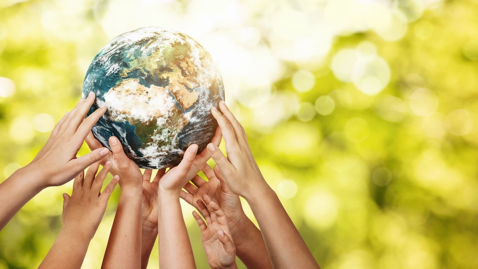 Close-up of children holding a globe at Legacy Vacation Resorts