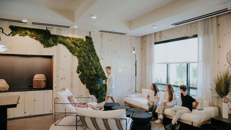 Family in lobby area of The Lodge 30A