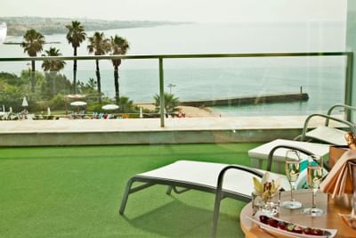 Sun bathing at your own balcony at Hotel Cascais Miragem
