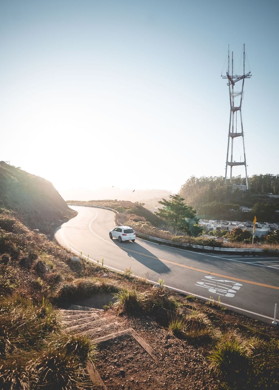 A car driving up a road in the mountains, The Originals Hotels