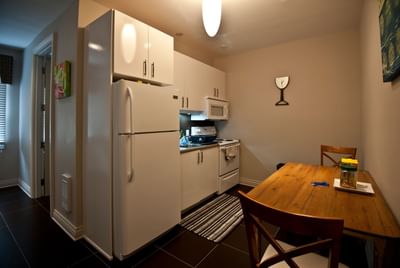 Dining table in the kitchen in Apartment 302 at Retro Suites Hotel
