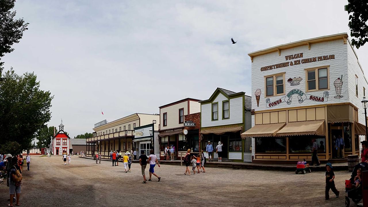 People walking on Heritage Park in Coast Calgary Downtown Hotel