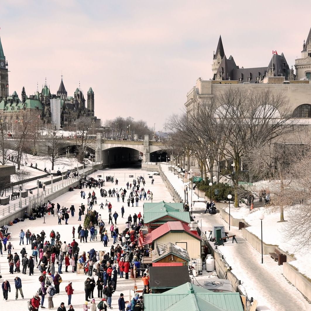 Tourists in the frozen Rideau Canal at ReStays Ottawa