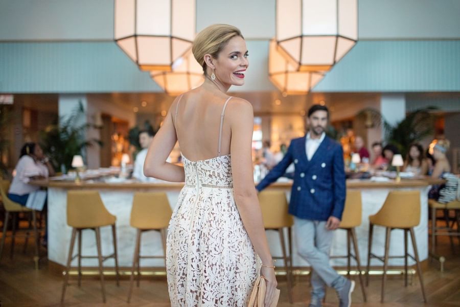 Lady in front of the Bar counter at The Diplomat Resort