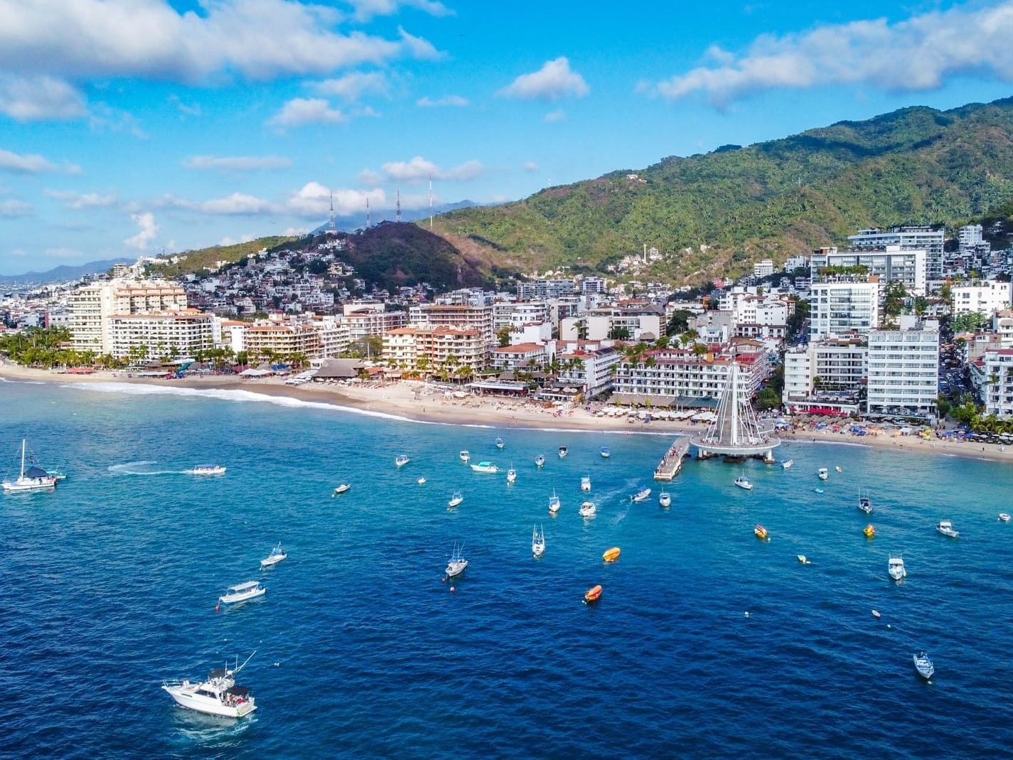 Distant view of city and Muelle Los Muertos Beach near Almar Beach Resort