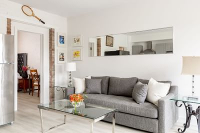Sofa & a coffee table in Apartment 199C at Retro Suites