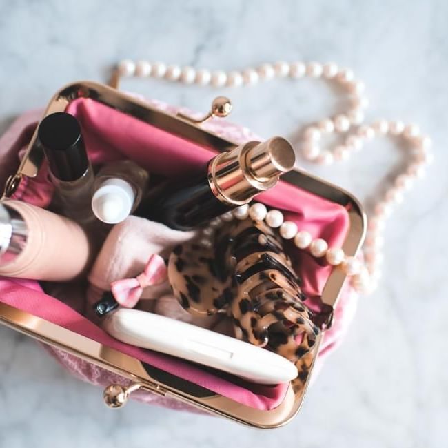 Wedding day emergency kit bag with essential items for the bride