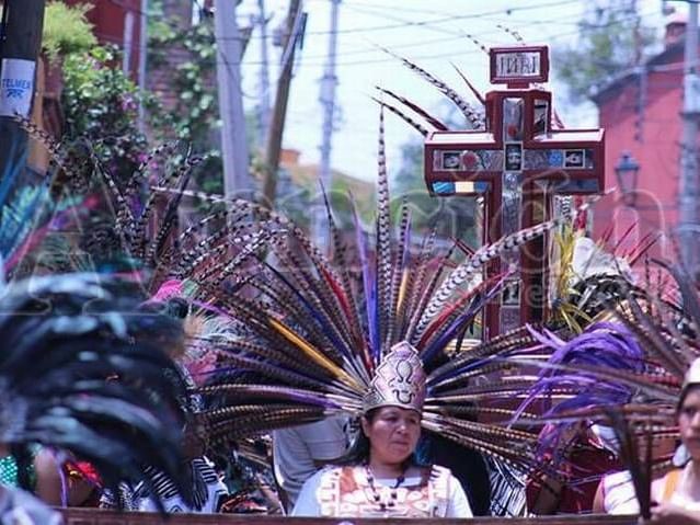 People gathered for a ceremony near Fiesta Americana Travelty