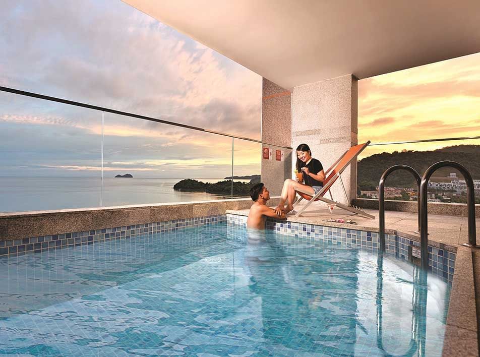 A couple was enjoying the moment in the private pool at Lexis Suites Penang hotel - Lexis Suites Penang