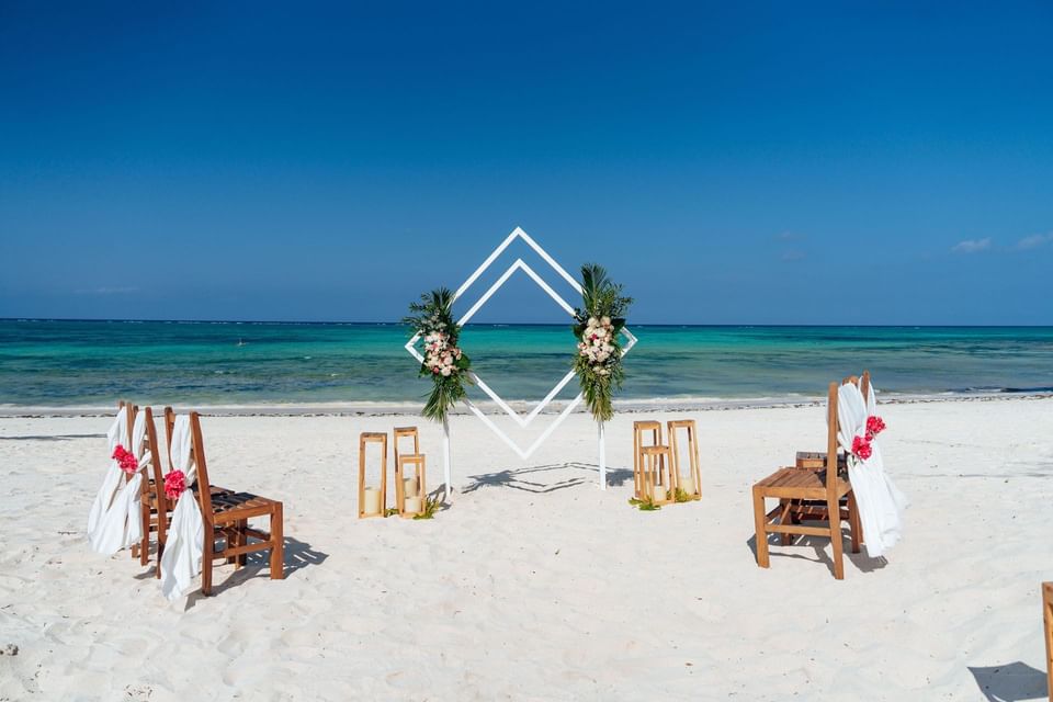 Wedding ceremony at beach near SafiraBlu Luxury Resort & Villas