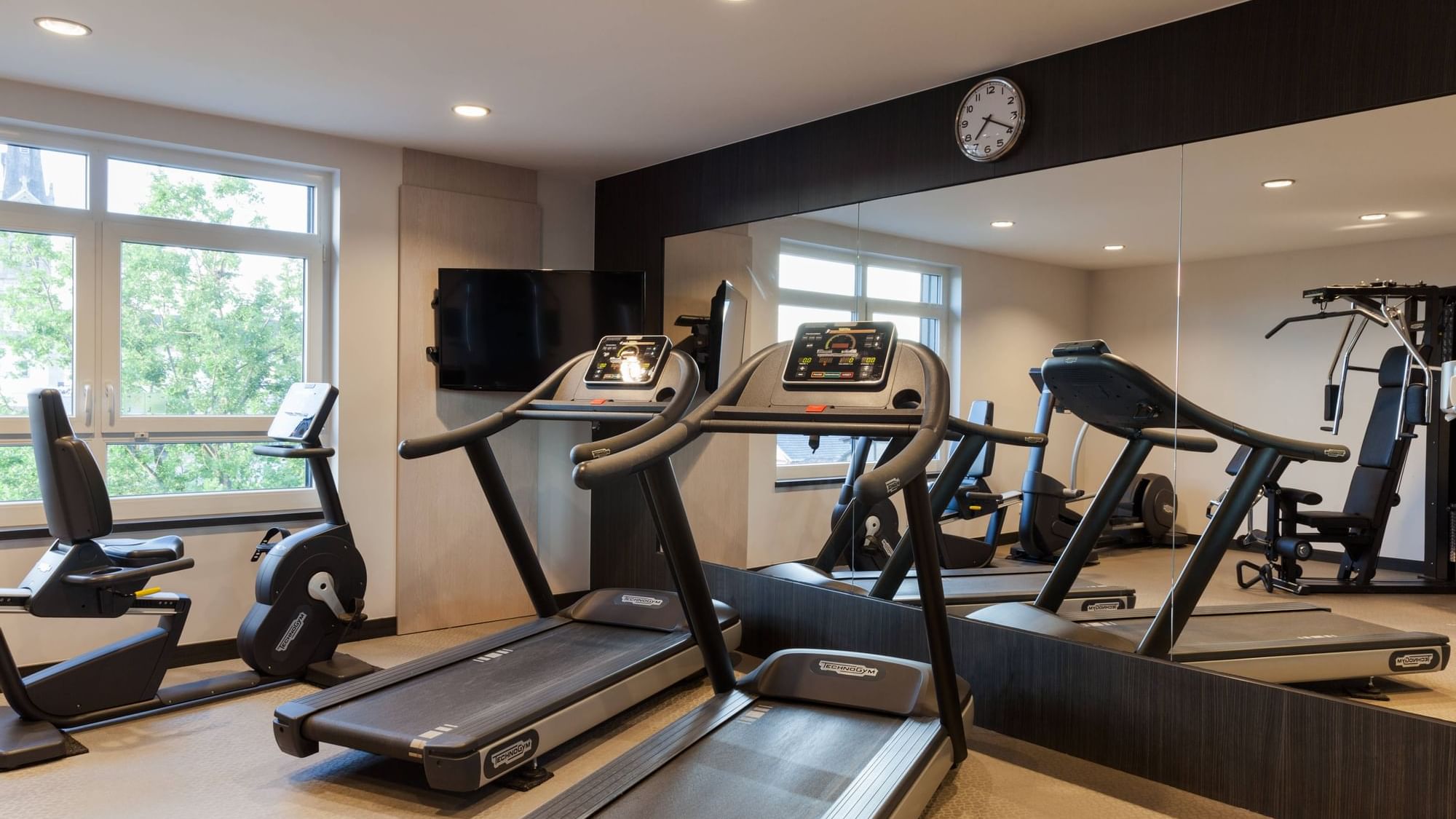 The fully equipped gymnasium at The Originals Hotels