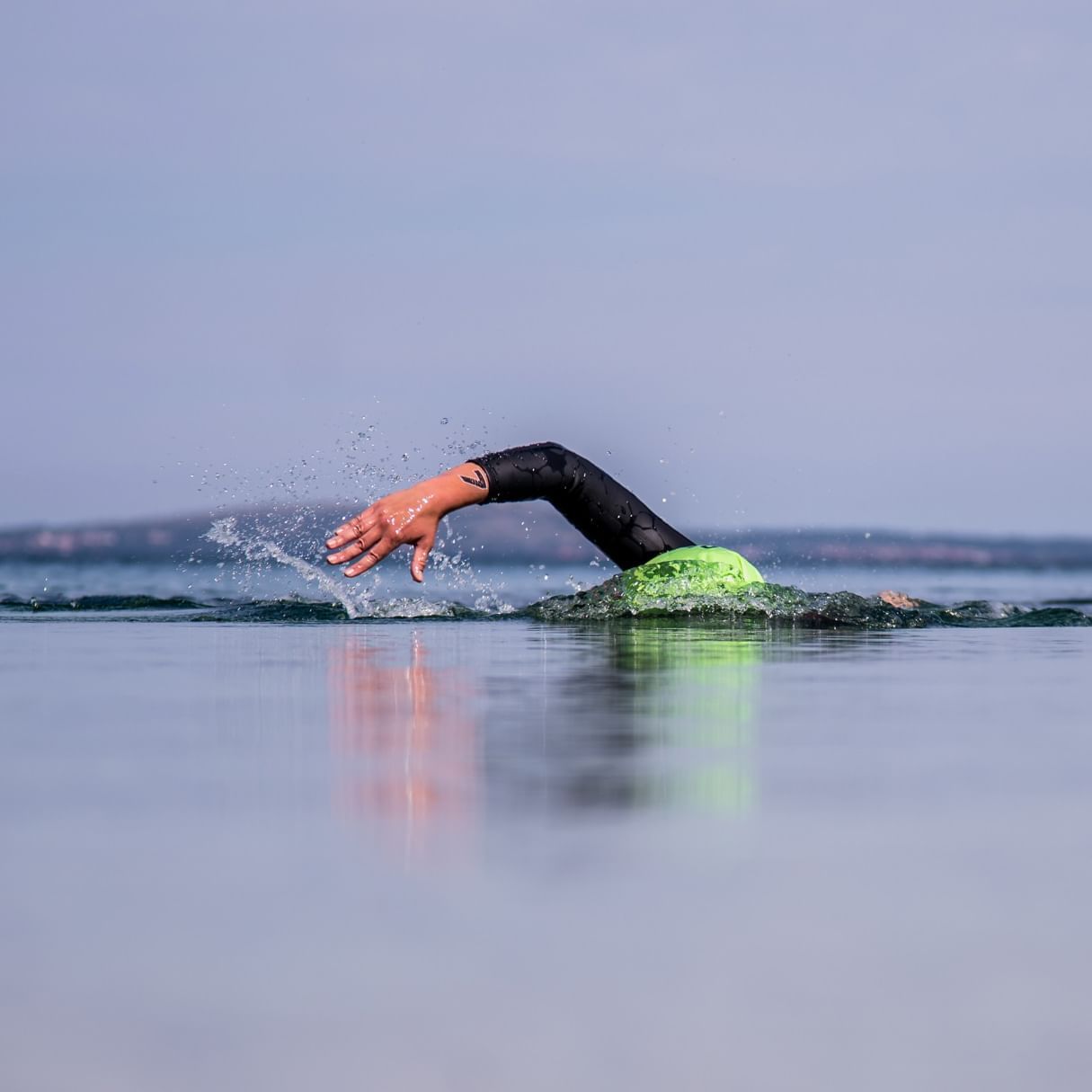 A swimmer in the water at Falkensteiner Hotels & Residences