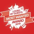 Logo of Loved by Guests Most Wanted Award at One Farrer Hotel