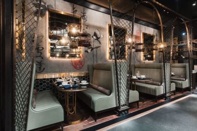 Luxury dining booth in Mott 32 at Paradox Hotel Vancouver