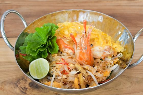 Pad Thai dish served at Maitria Hotels & Residences