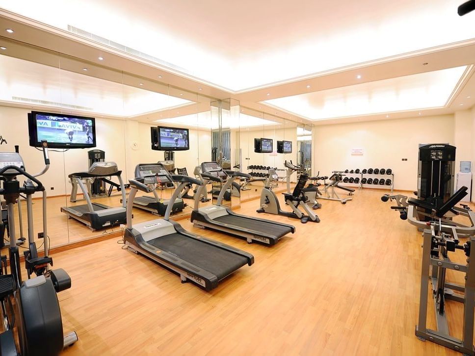 Fitness Centre with exercise machines at Al Hamra Palace by Warwick Riyadhd