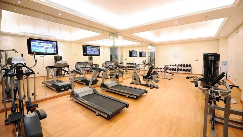 Fitness Centre with exercise machines at Al Hamra Palace by Warwick Riyadhd