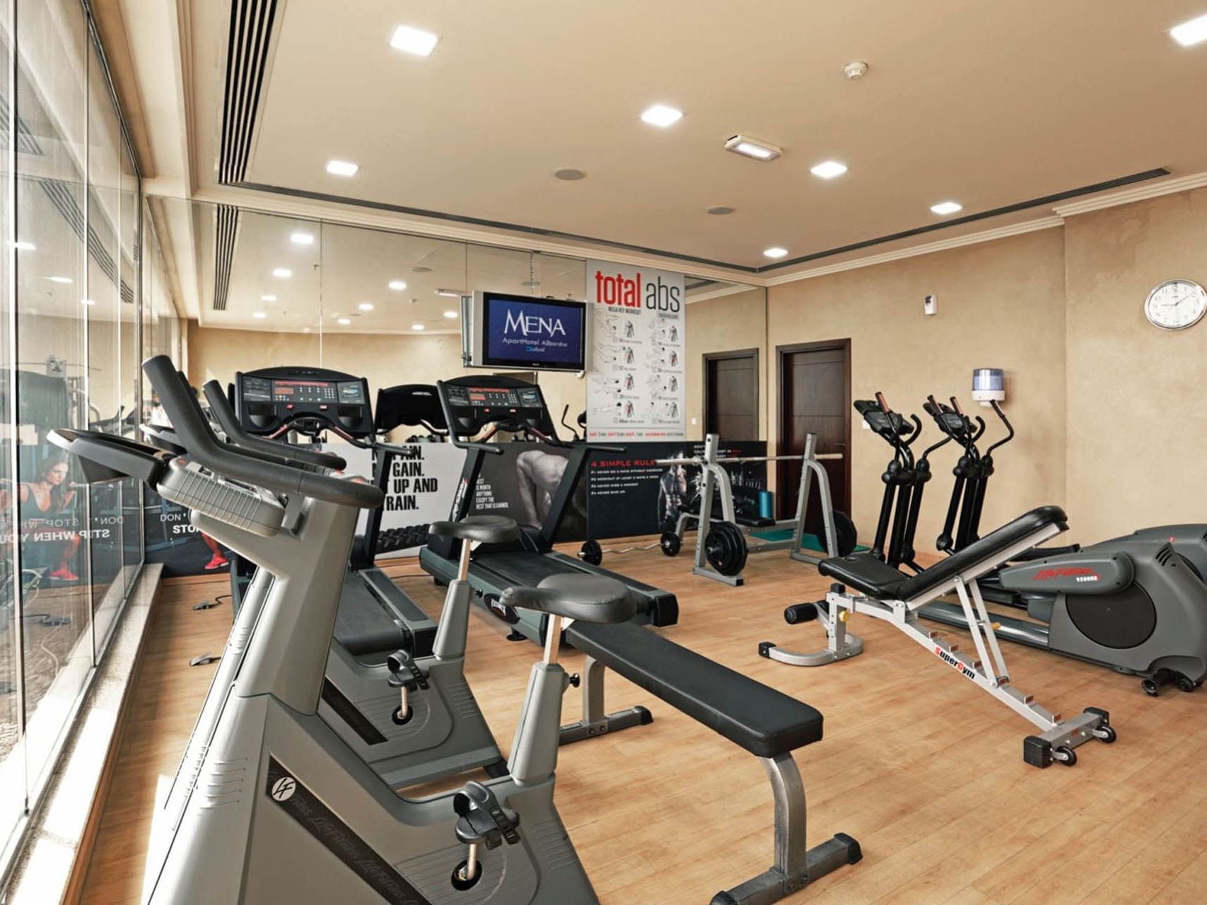 Fully equipped gym at Mena ApartHotel Albarsha Dubai