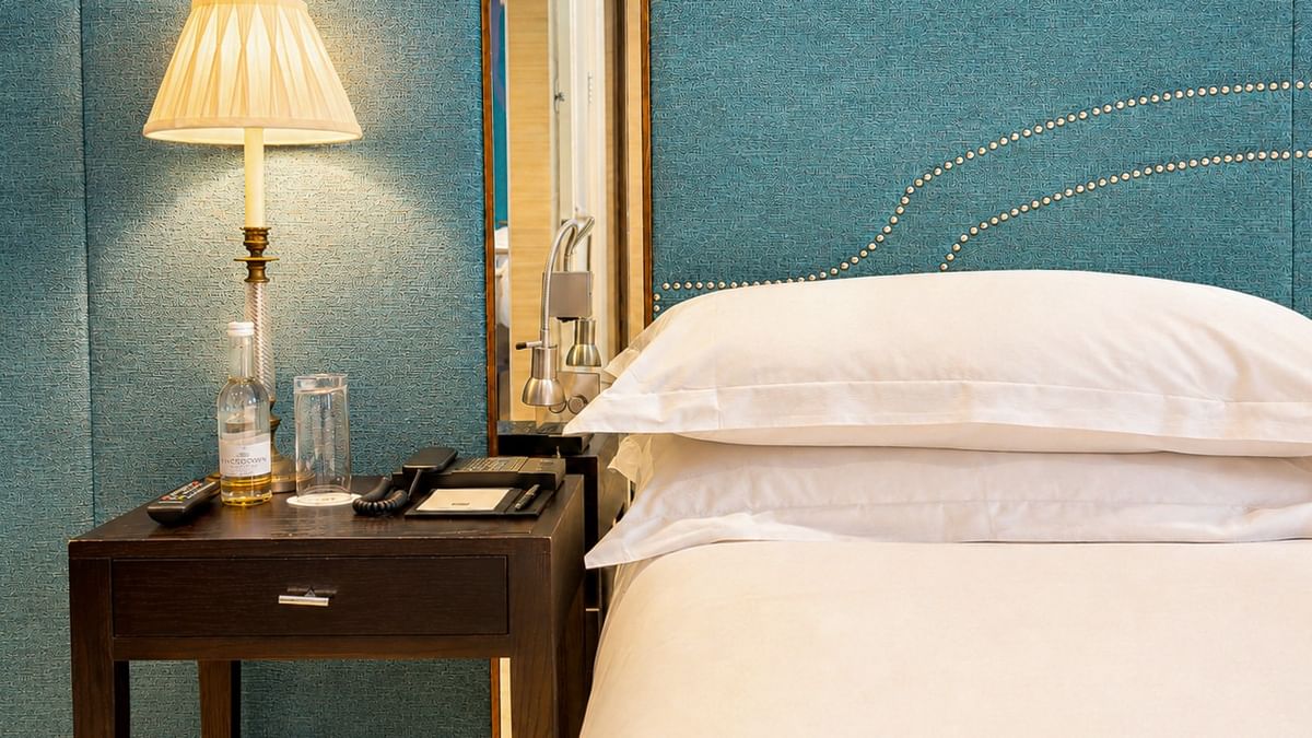 Classic Townhouse King / Twin bedroom with blue decor at The Capital Hotel, Apartments & Townhouse London.