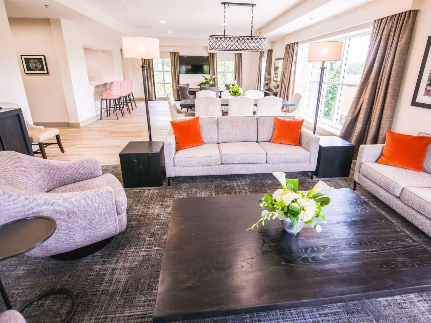 coffee table, couch, and chairs, view of suite