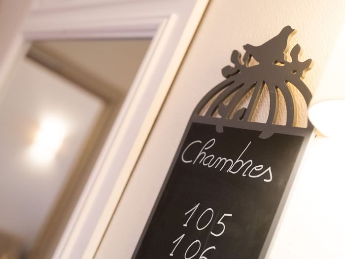 A wall with room number in a hotel at Le Kastelberg