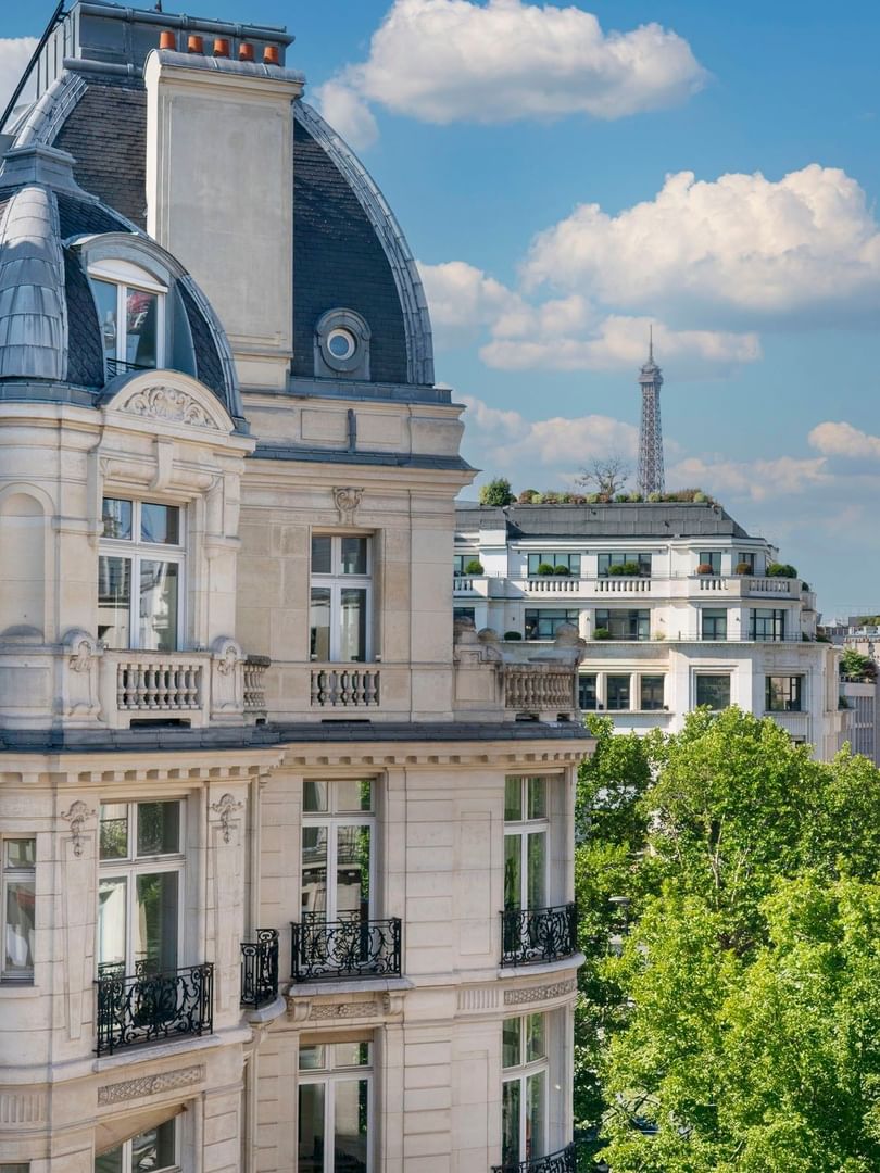 Stone buildings with balconies near the Eiffel Tower in Executive Suite with Terrace at Warwick Paris Champs Elysées
