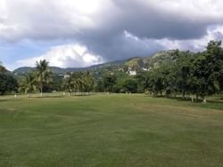 Constant Spring Golf Club near Jamaica Pegasus Hotel, with mountain backdrop, showcasing attractions in Kingston Jamaica 
