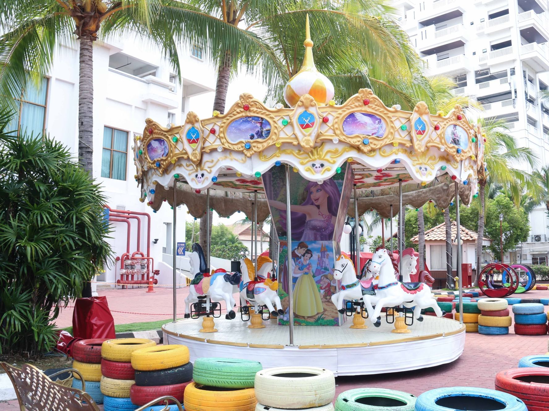 Fairy tale-themed merry-go-round for children at Lexis PD