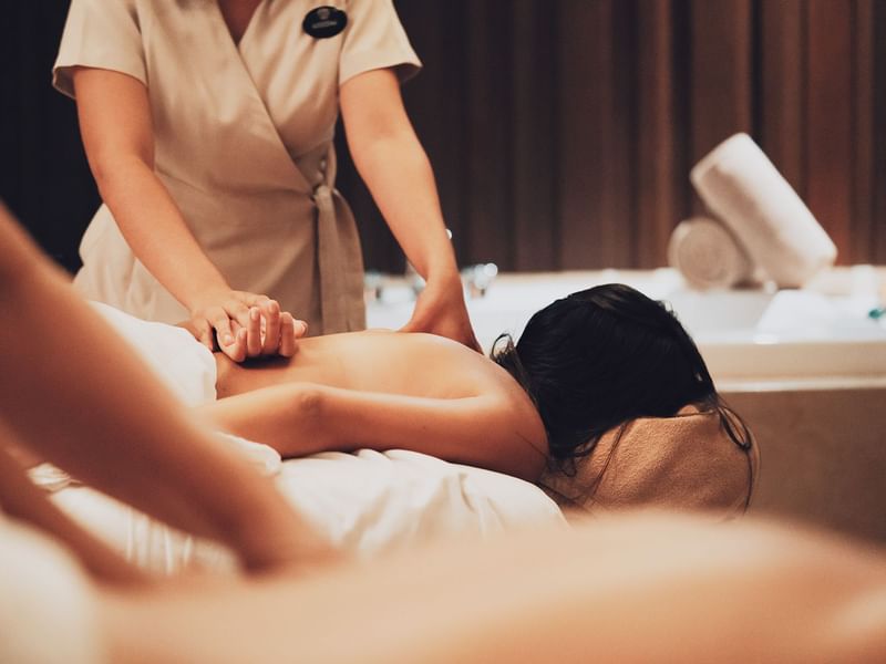 Closeup of a lady receiving a body massage at The Reef 28