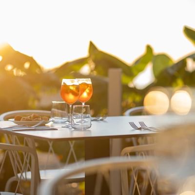 Two glasses of wine on table at Beach bar, Falkensteiner Hotels