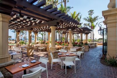 Outdoor dining area in Convivo restaurant at Santa Barbara Inn