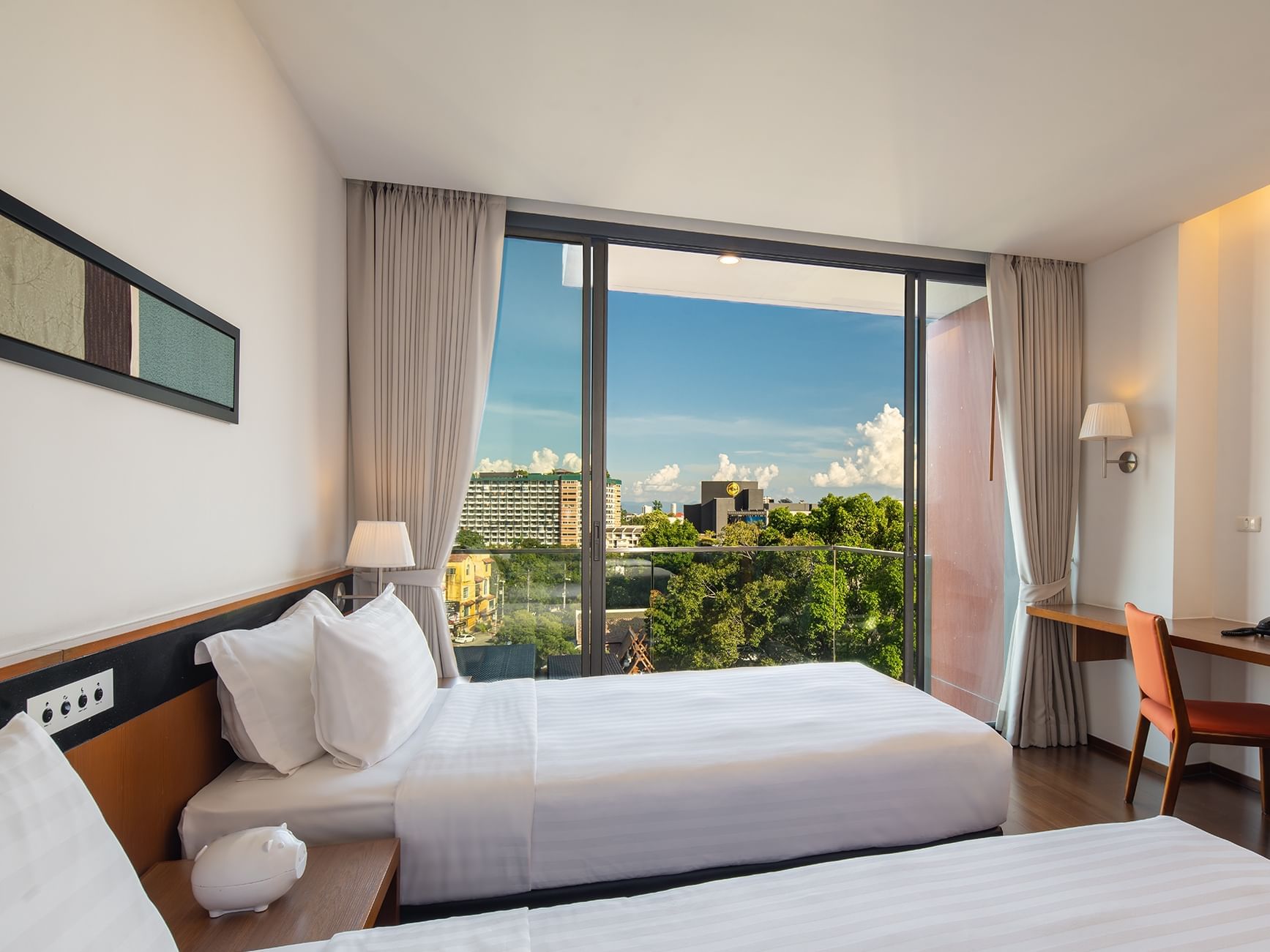 Comfy beds with city view in Superior Premium at Eastin Hotels
