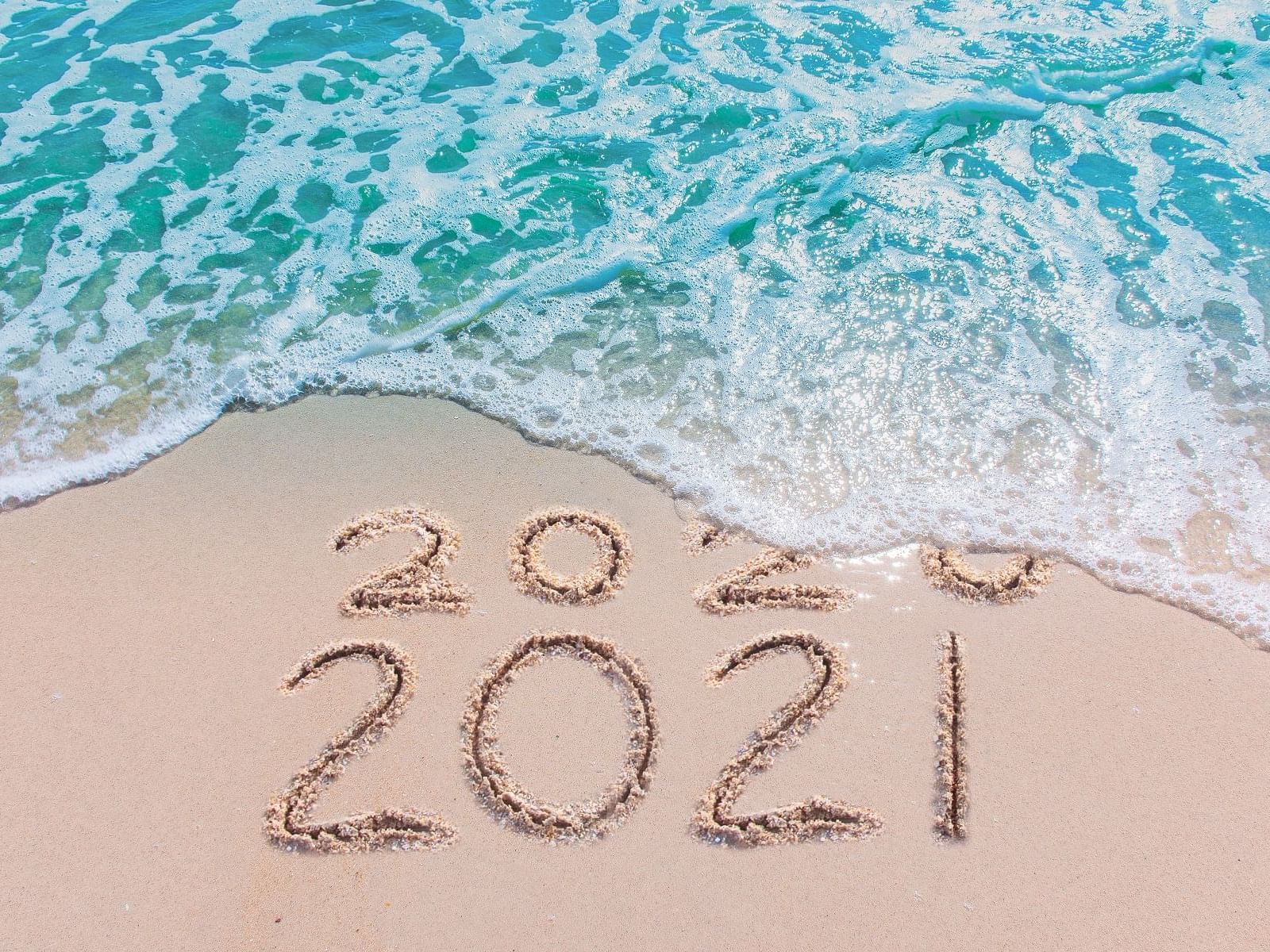 2021 written on beach at Daydream Island Resort