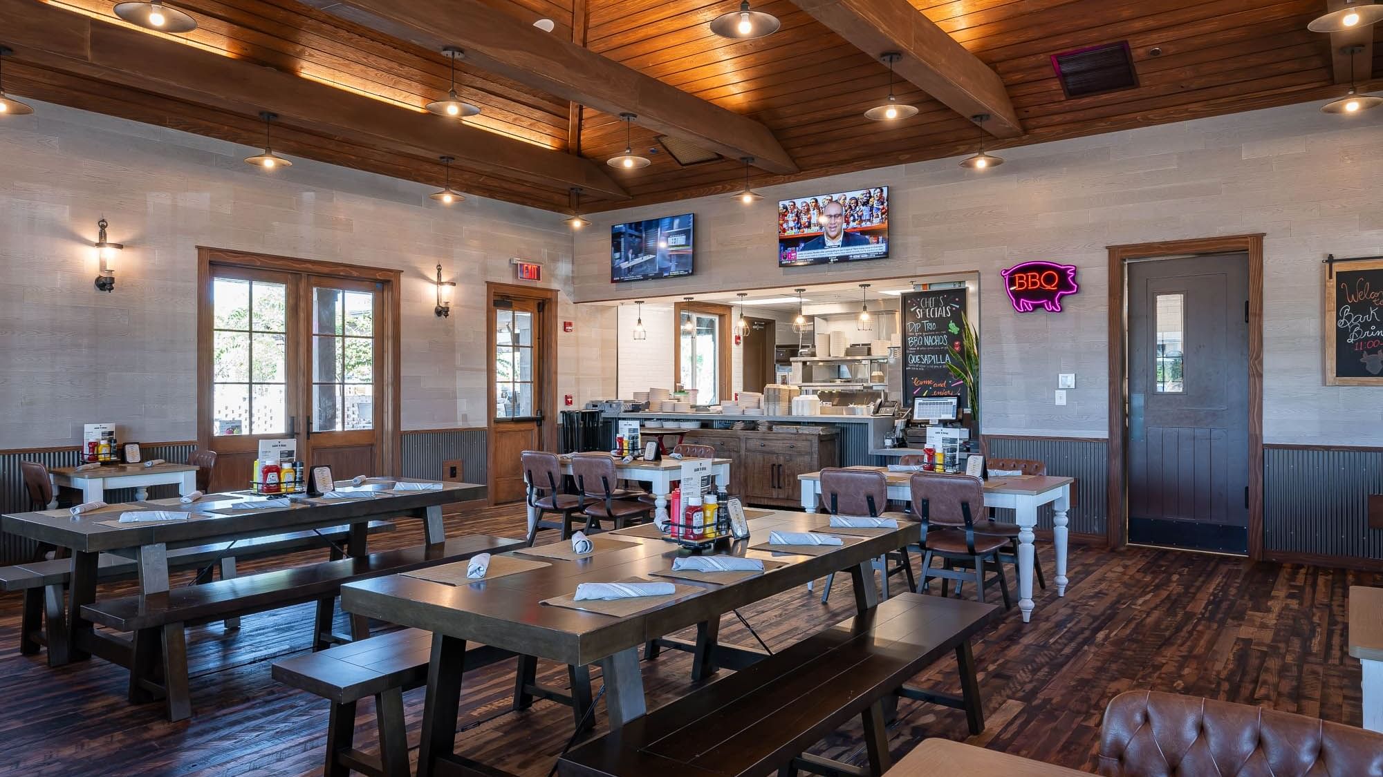 Dining tables & counter area in Bark ‘N Brine at Camp Creek Inn