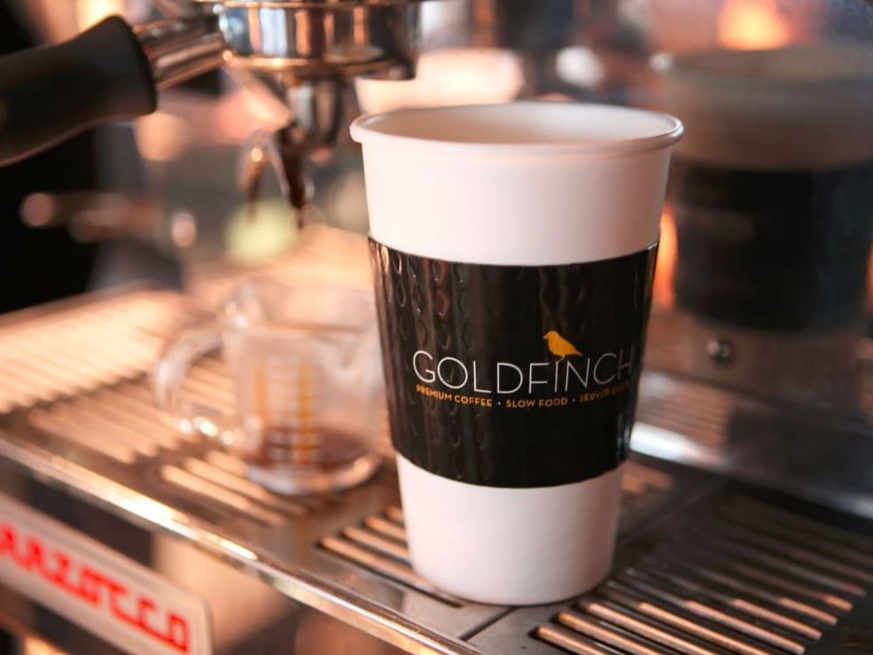 Coffee cup near a coffee machine at The Time New York