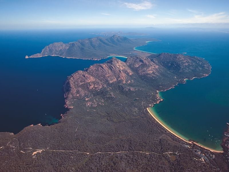 Aerial view of Hazards mountain range with the Bay near Freycinet Lodge
