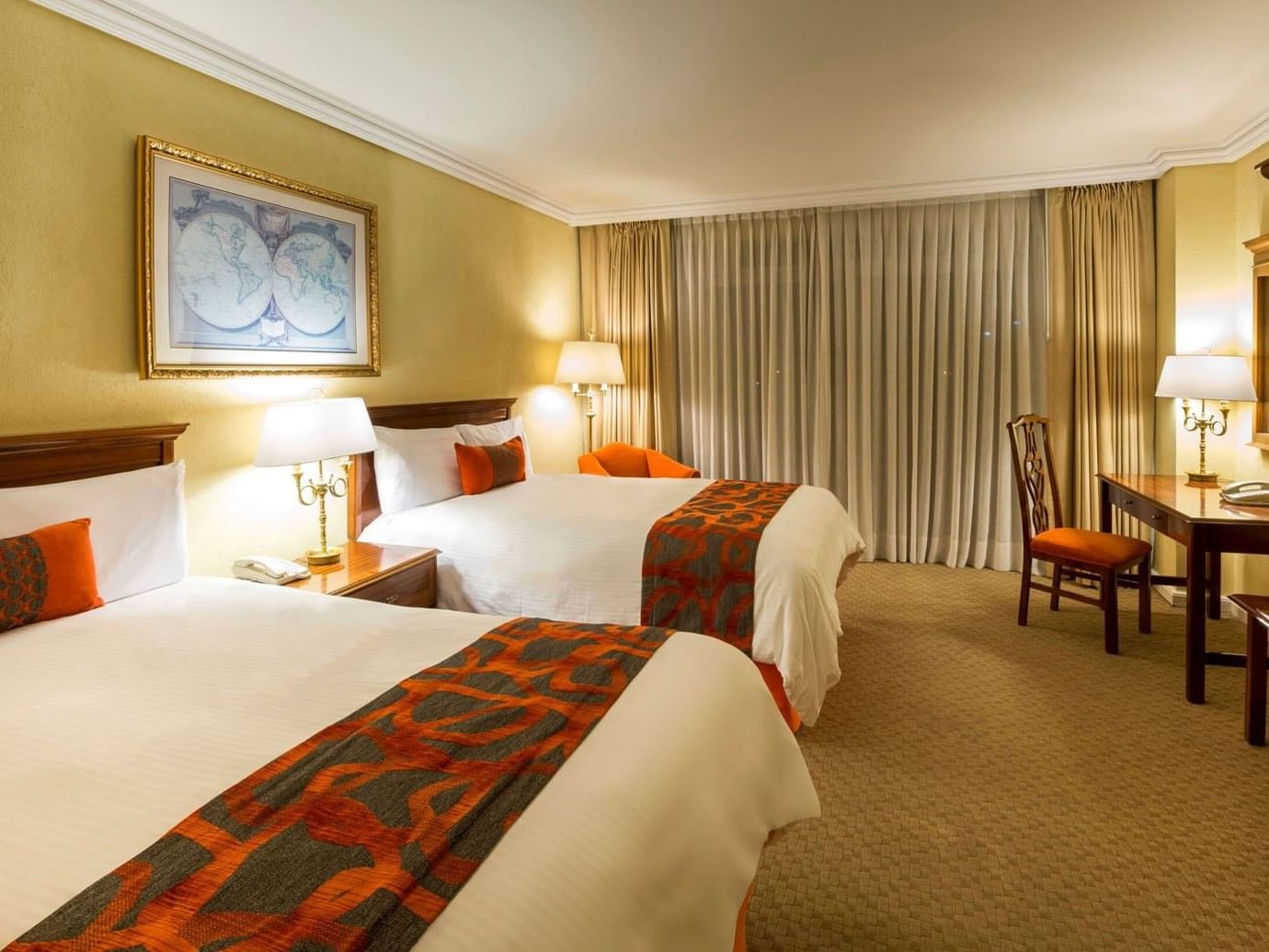 2 Double Deluxe room featuring a classic world map and a dedicated work desk at Camino Real Puebla Angelopolis